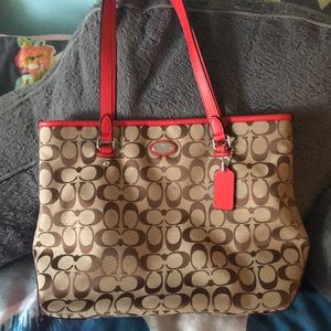Orange and khaki coach purse
